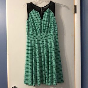 Mint green polka dot dress with black mesh.